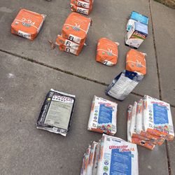 Lots of tile grout/ mortar different colors