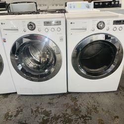 LG electric washer and dryer—includes a receipt for a 90-day warranty.