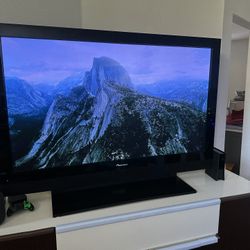 Pioneer 60” Plasma, with sound bar, remote, base stand and wall mount