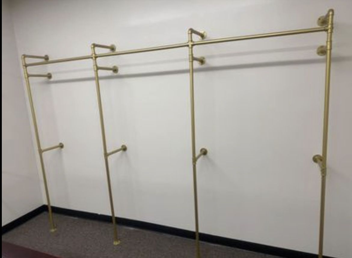 Golden wall mounted Clothing Rack Retail & Services