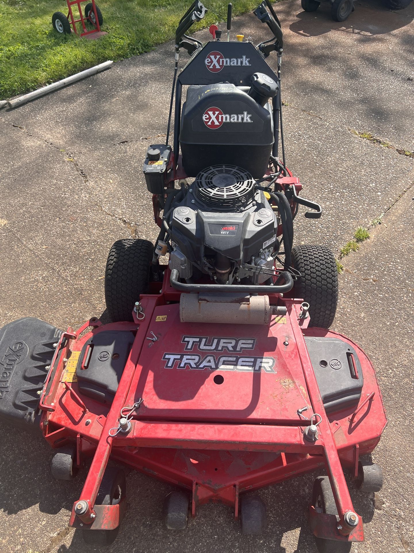 ALMOST NEW Exmark Walk Behind 48β Turf Tracer
