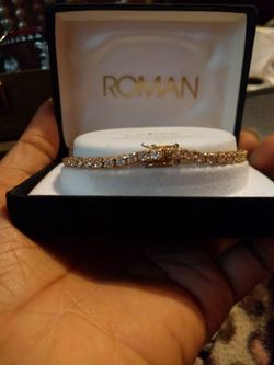 Cubic Zirconia gold tennis bracelet
