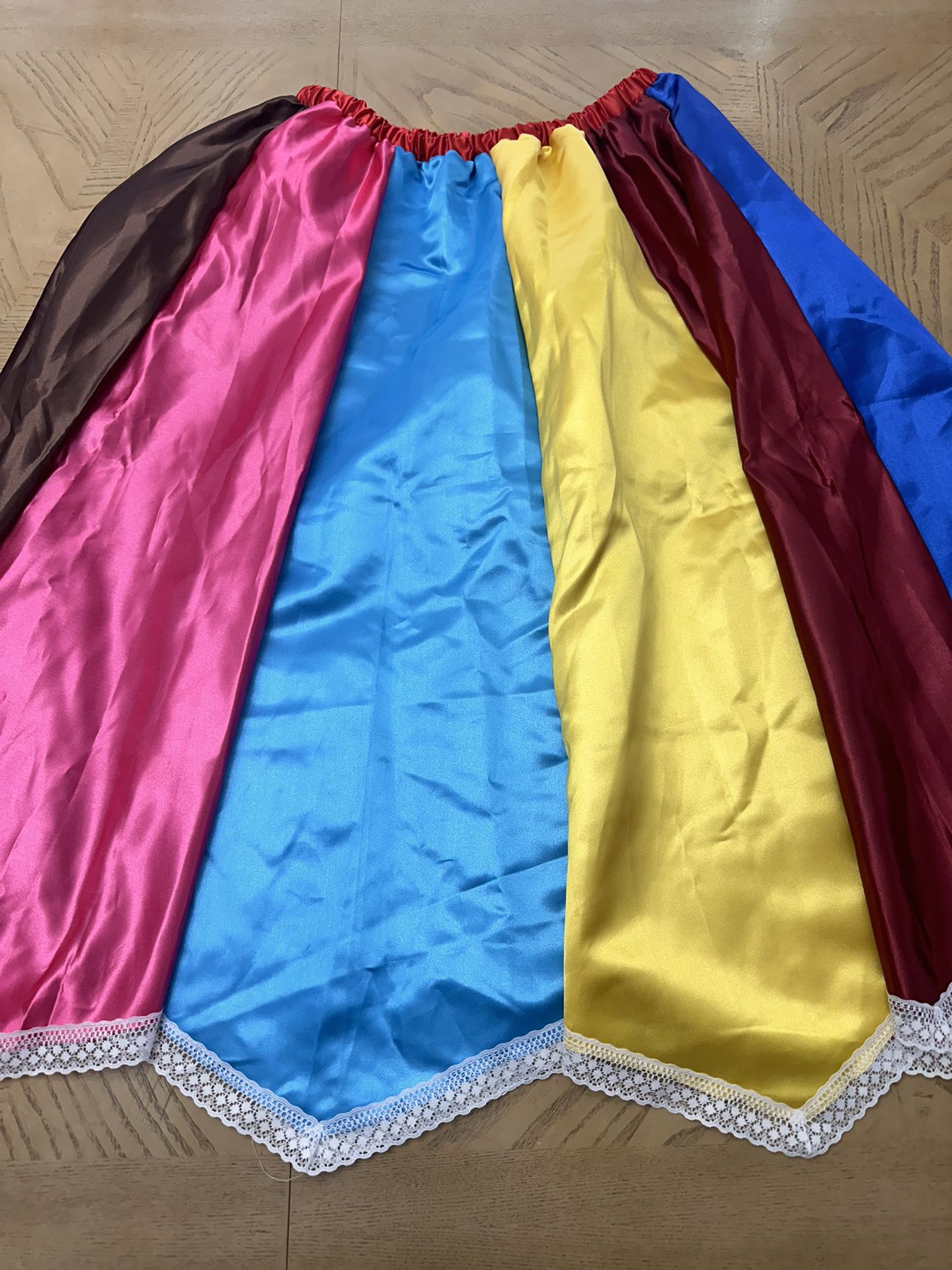 Woman’s skirt multi color satin  Waist 14” Length 26”