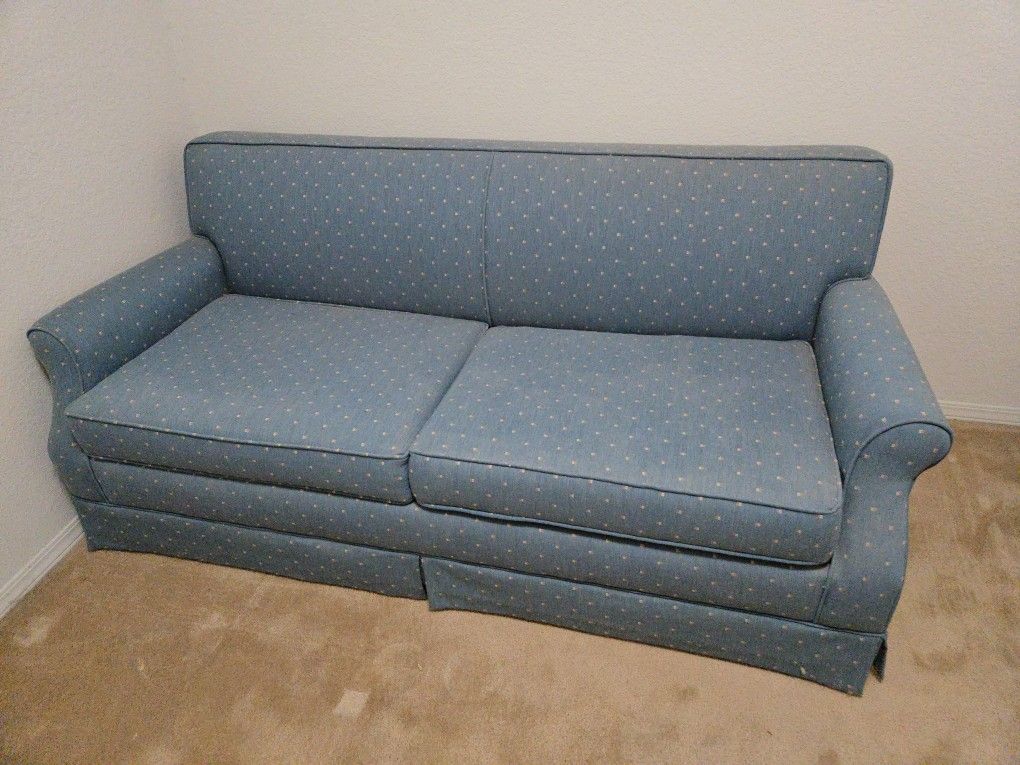 Blue Sleeper Sofa Hardly Ever Used.