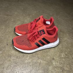 Red Adidas shoes