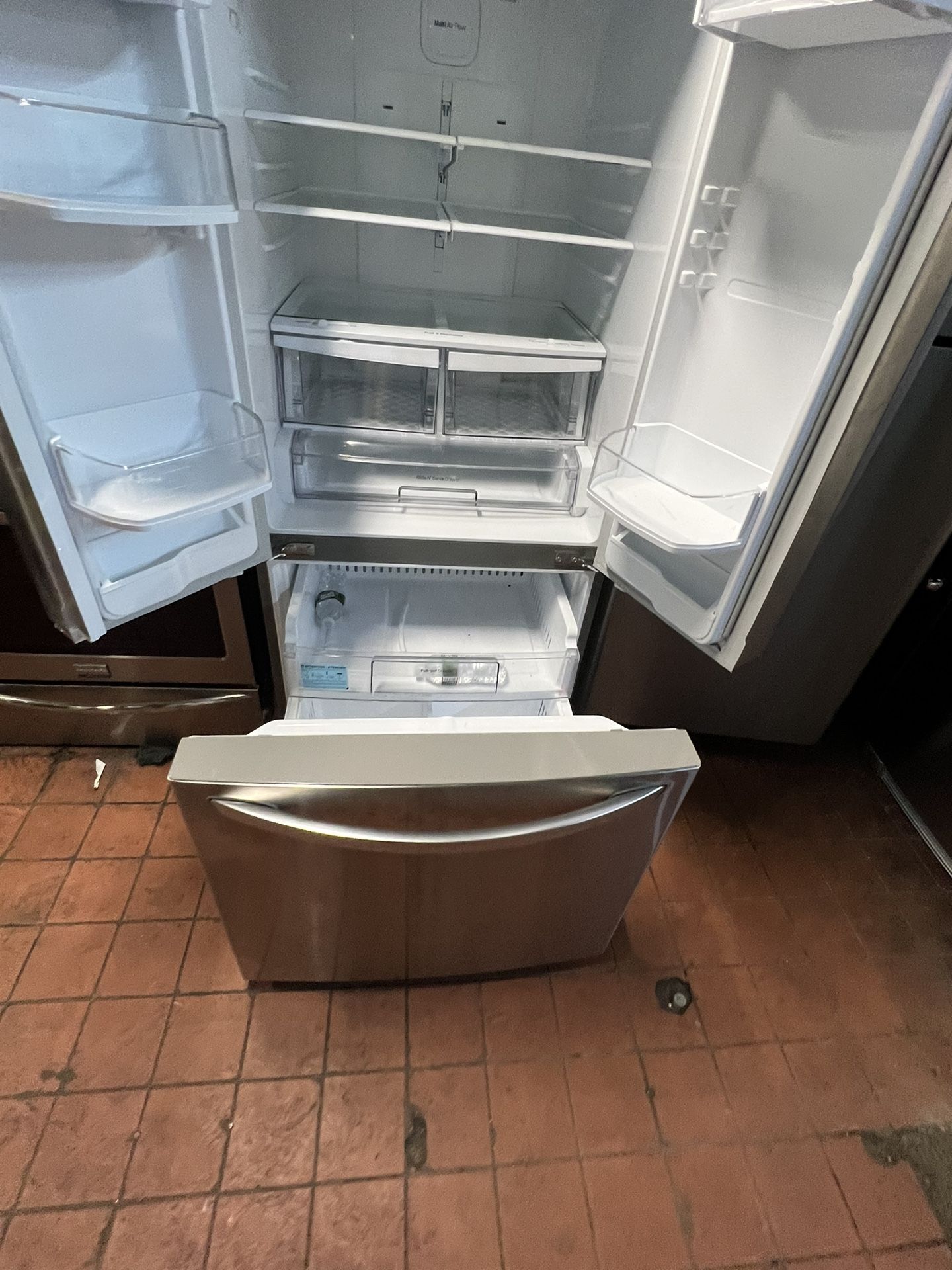 LG 70X30X31 French door refrigerator/neveras tres puertas Stainless