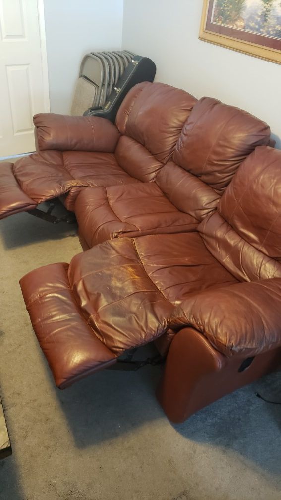 Burgundy leather recliner sofa