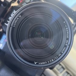 (Needs Repair for Full Function) Panasonic Lumix G X Vario 12-35mm f/2.8 Power O.I.S. lens