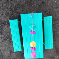 A Barbie Doll Picnic Table With Benches