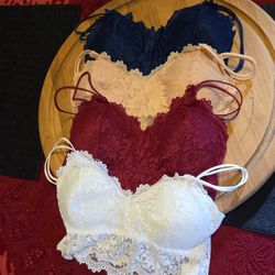 4 Lacy Bra's. Red, white, beige, blue. Size  L-XL