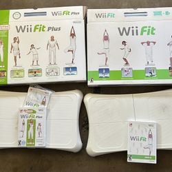 Nintendo Wii Fit and Wii Fit Plus Boards in box with games
