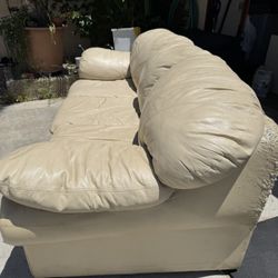 Used Beige Leather Sofa – Still Comfy! $20 (Cat-Scratched)