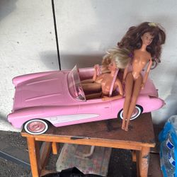 3 Barbie dolls plus a Barbie Hot Wheels Corvette
