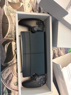 F32-000-571 PLAYSTATION PORTAL HAND HELD WITH CHANGER IN BOX