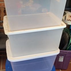 Four Storage tubs in good condition