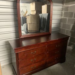 Brown Sleigh Bed With Dresser And Nightstand