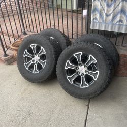 18” GMC Stock Wheels On 33” Toyos