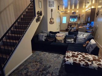 Blue and grey sectional couch