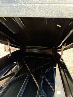 18 cubic feet hard-shell carrier.