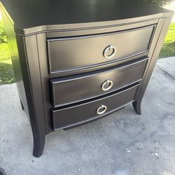 One dark brown nightstand