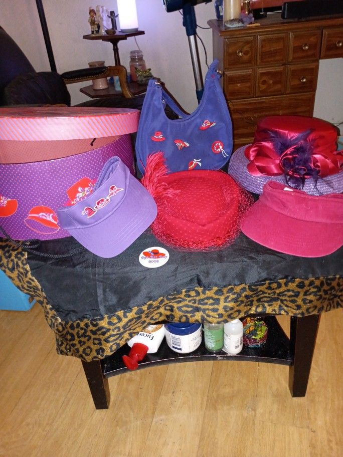 Two Beautiful Red Paths To One Sun Visor That Is Red One Sunrise Visor That Is Purple We Have One Purple, Purse, Too Sun Visors, One Hat Box