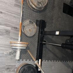 barbell with curl bar and 200 pounds of weight