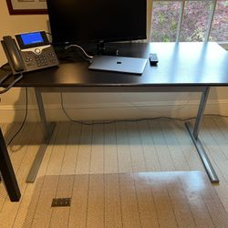 Metal and laminate desk in VG condition 18d x 55 x 29h Smoke and pet free household