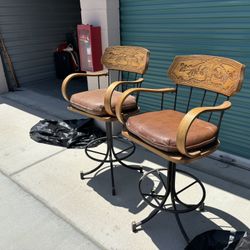 Two Swivel Oak Bar Stools