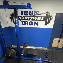 Plate Loaded Lat and Low Row Machine made By Legend Fitness. 