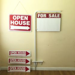 L shape metal rack with several signs , all for $20.