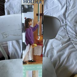 Mop and broom wall organizer