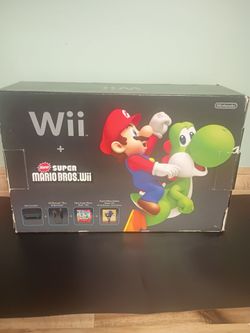 New super Mario Bros Nintendo Wii complete in box with Wii sports open box