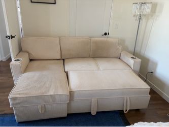 Three seater large couch with storage