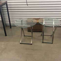Two Tables With Round Glass Top