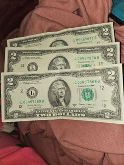 Three $2.00 bills