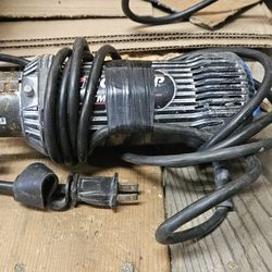 Dremel rotary tool with power cord. With bits