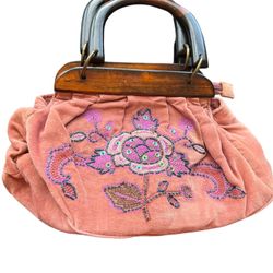 Y2K Avon Mauve Pink Velvet Beaded Handbag Wood Handles Embroidered  This Avon handbag is a must-have for any fashion-forward woman. The mauve pink vel