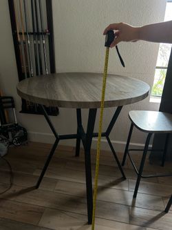 Dinner table with chairs