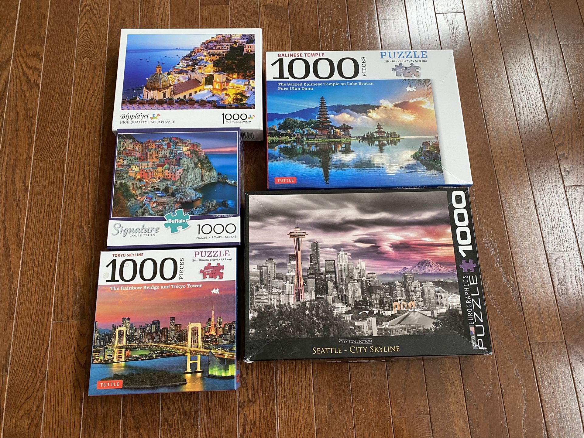 5 Set of 1000 piece Puzzle 20$