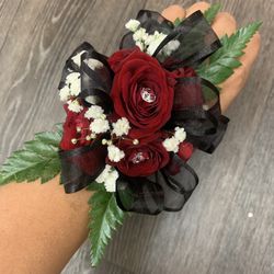 Red And Black Corsage Available 