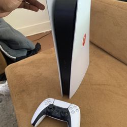PS5 console w/ DualSense controller and custom Beats plates 