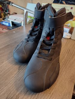 Black High-Top motorcycle boots with built in steel toe and side armour