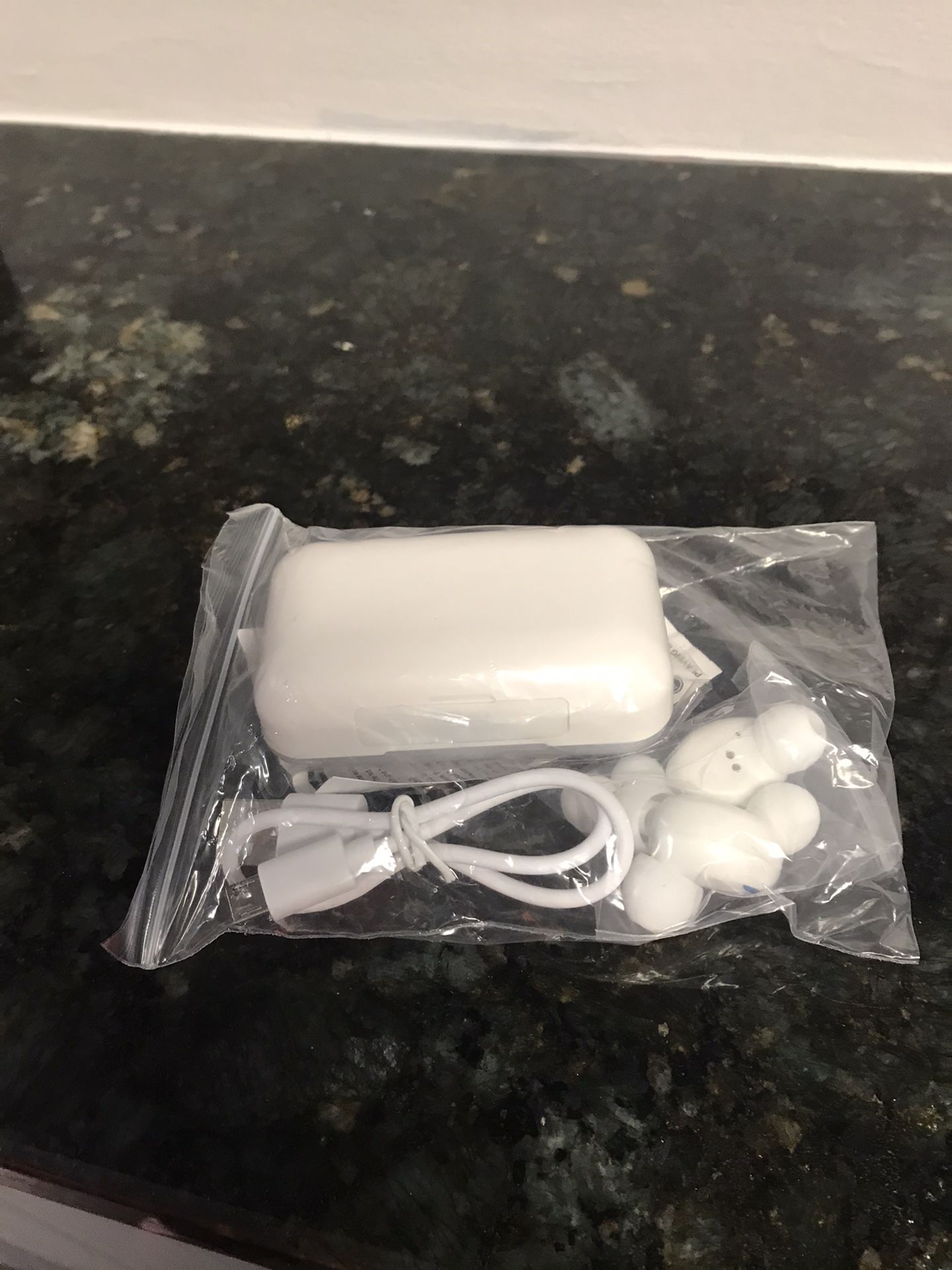 New wireless earbuds with charging case