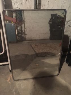 Bathroom mirror with medicine cabinet 22 inches long and 16 wide