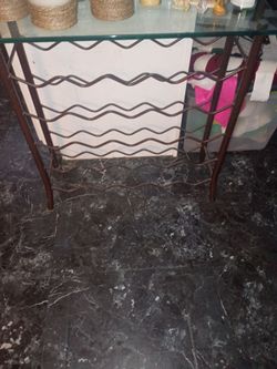 Wine shelf with glass top