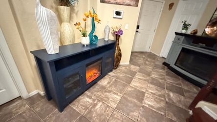 Beautiful blue fireplace /tv stand in excellent condition