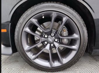 Dodge Challenger wheels and Goodyear tires like new Dodge Challenger wheels and Goodyear tires