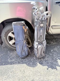Golf clubs and 2 golf bags