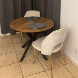 Coffee Table With 2 Chairs ( OBO)It’s wood + metal + tan plush chairs 