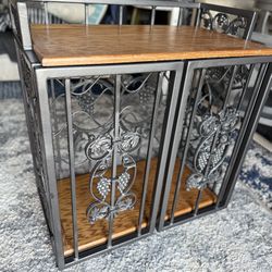 decorative wine rack or wine cabinet with a grape and vine motif. 